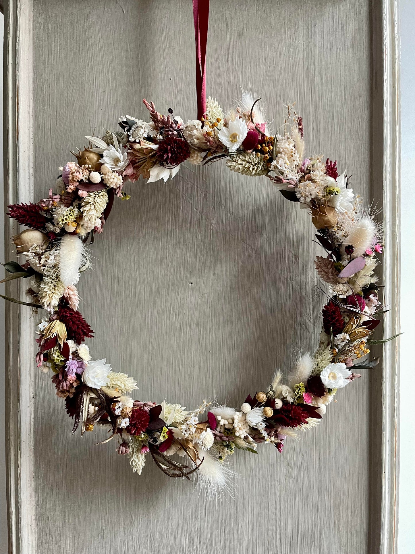Couronne de fleurs séchées - à suspendre
